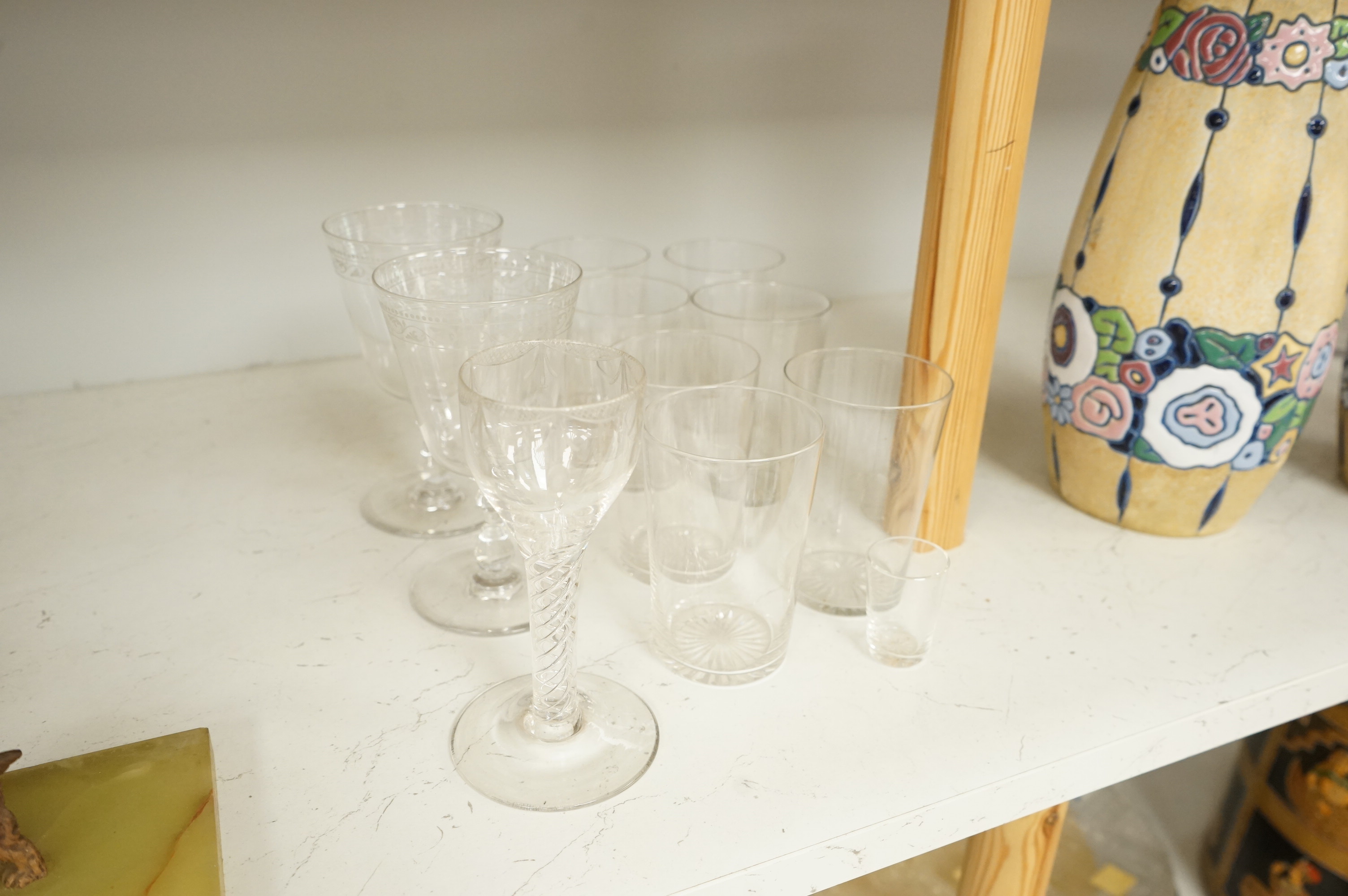 A pair of engraved glass goblets, seven tumblers engraved with the initial G and an air twist stem wine glass, etc. (12)